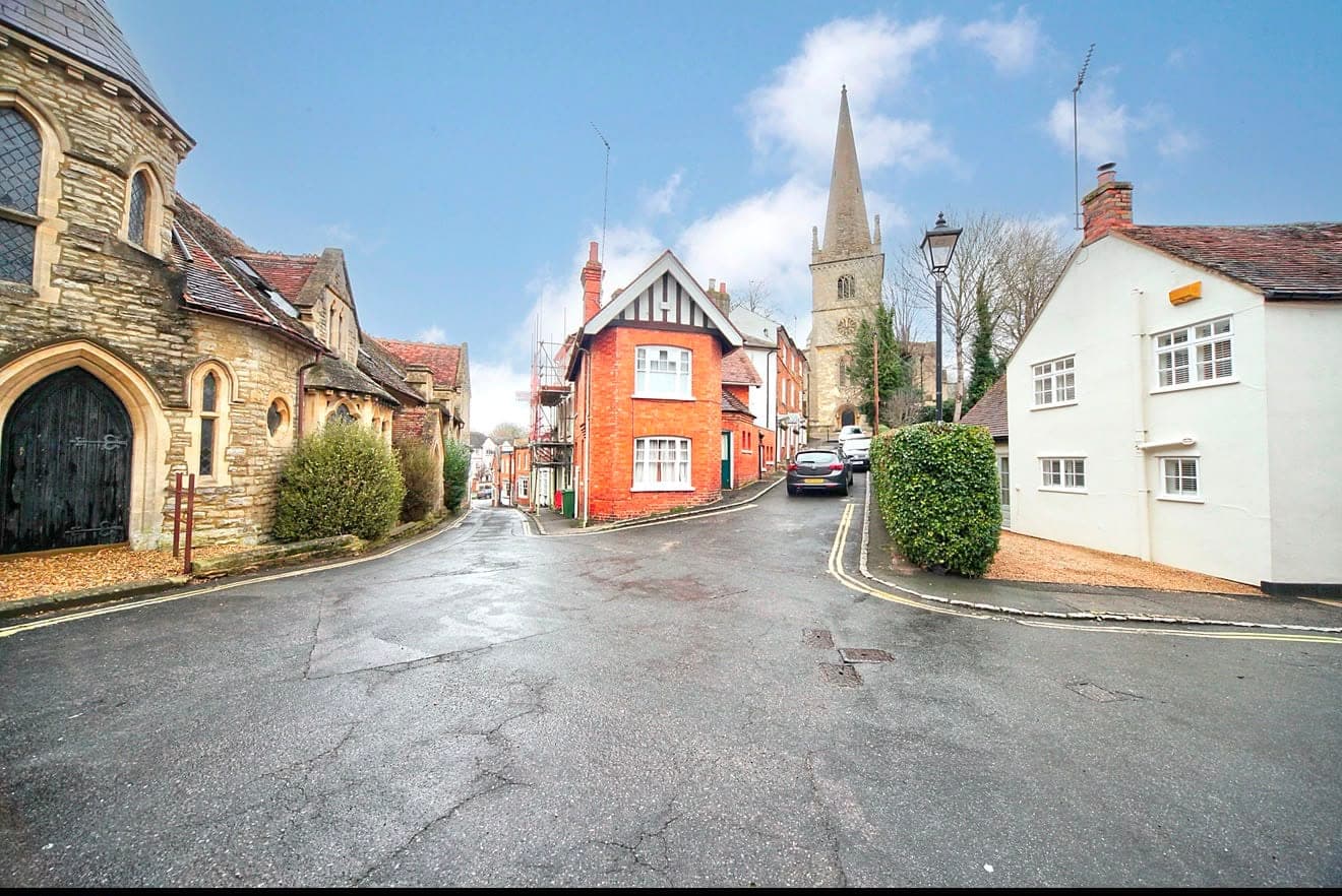 Buckingham Historic Buckingham town centre with the parish church spire and period cottages
